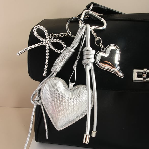 Breloques de sac pour femme en corde tressée avec nœud en forme de cœur en PU argenté de qualité supérieure