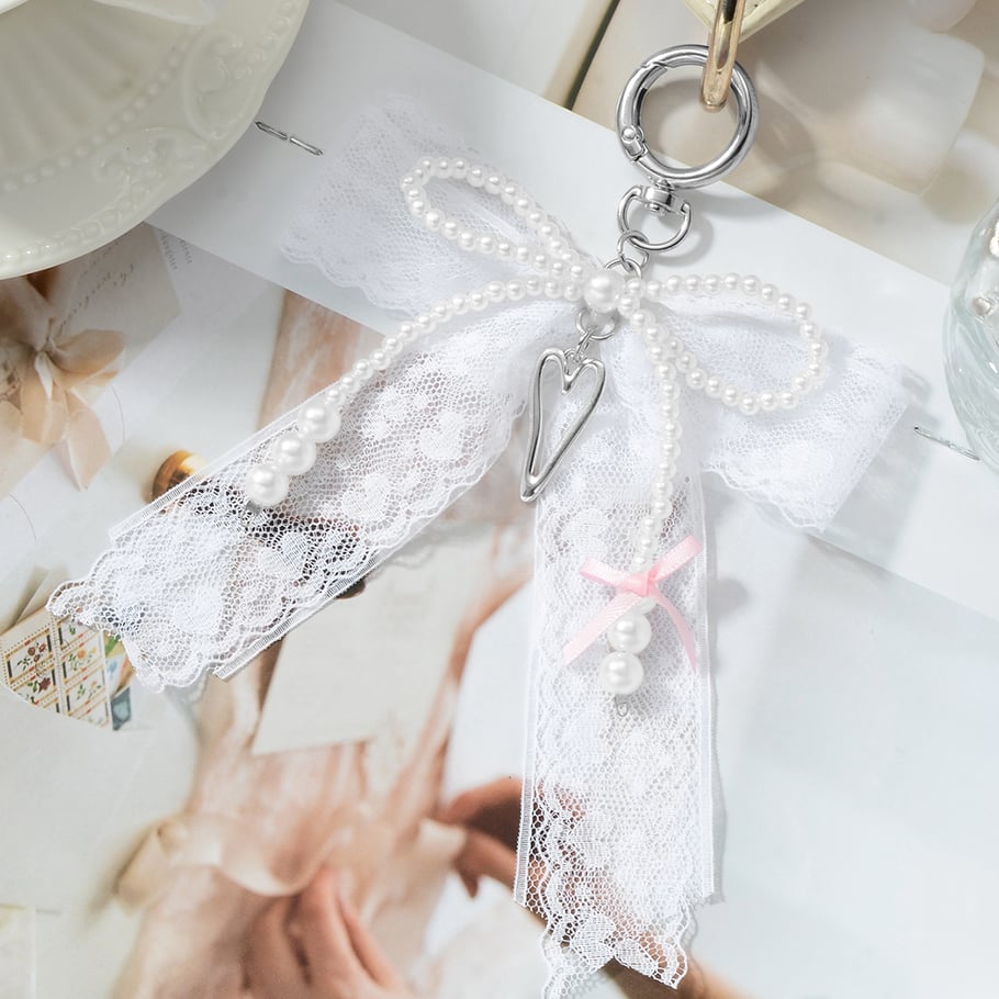 Taschenanhänger mit Perlen und Schleife Bild9