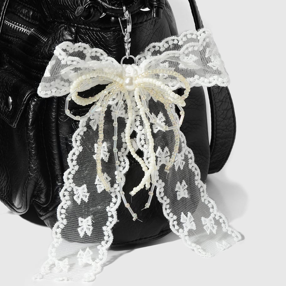 Taschenanhänger mit Spitzenschleife und Knoten Bild7