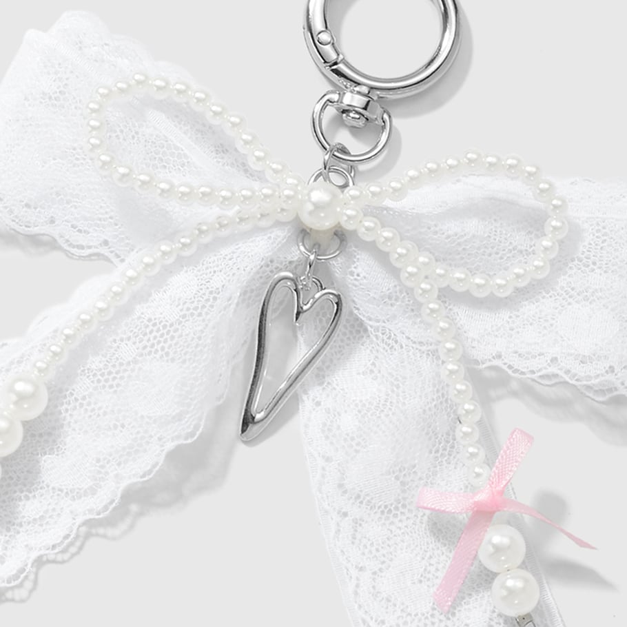 Taschenanhänger mit Perlen und Schleife Bild10