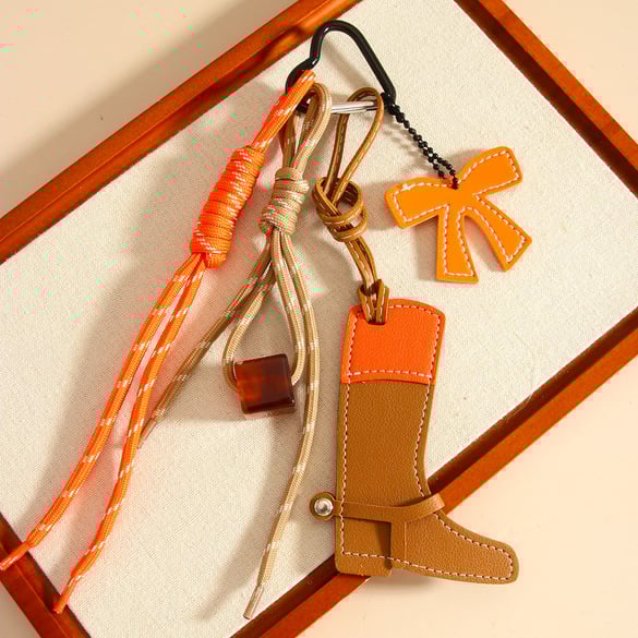 Accessori per stivali da cowboy western con pony color block, ciondoli per borse da donna