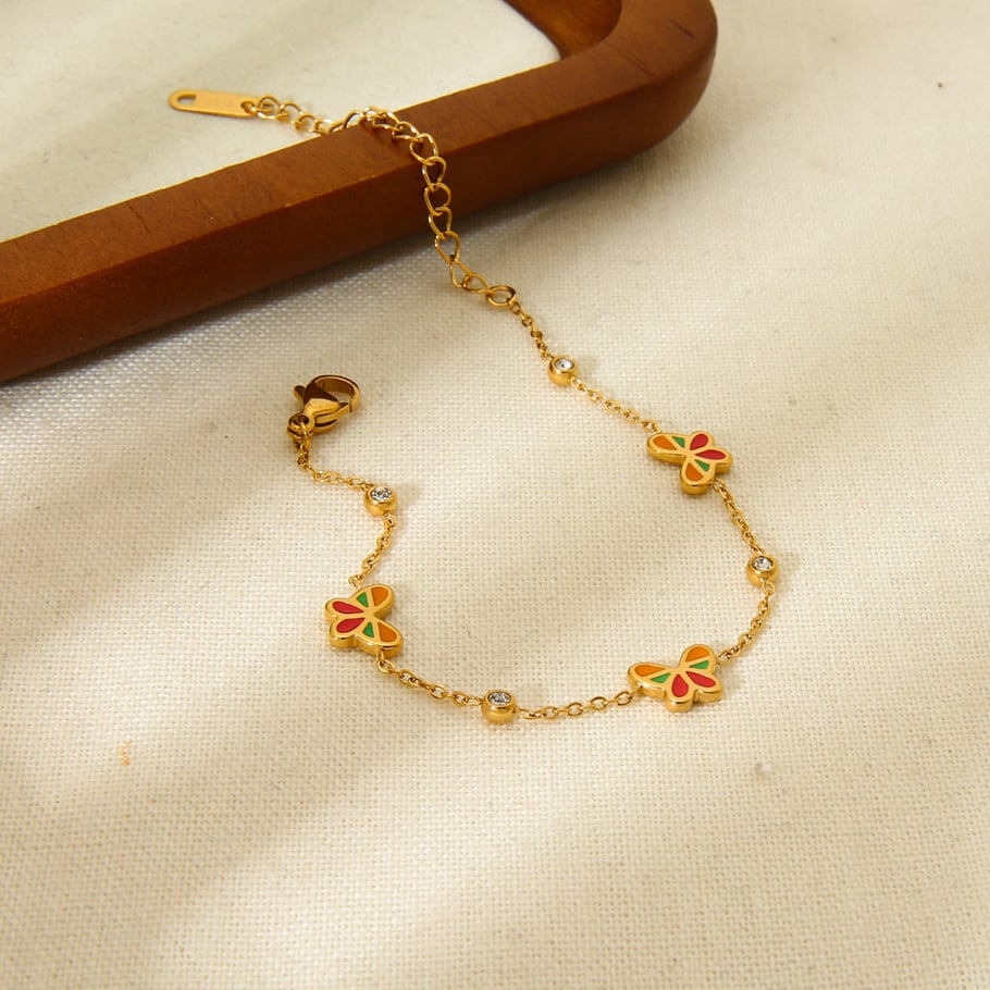 Bracelets tendance en acier inoxydable pour femme avec papillons colorés Image4