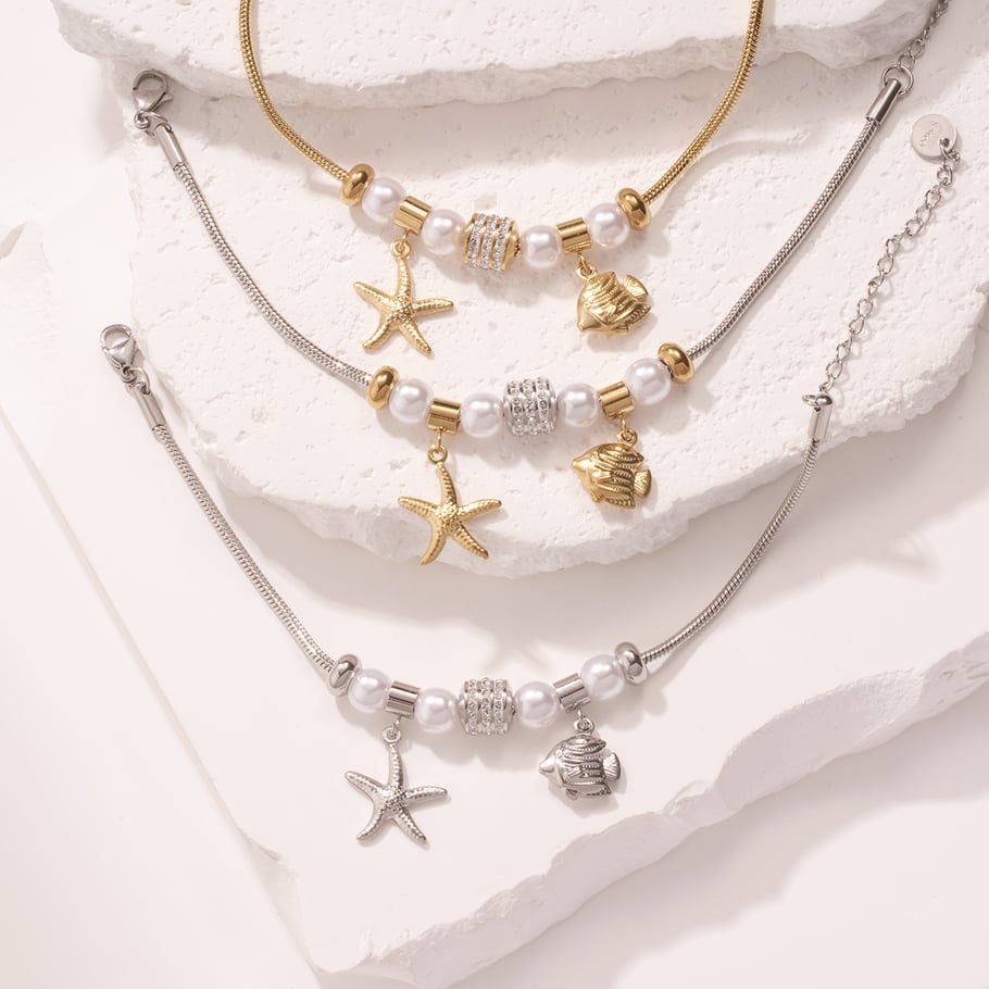 Braccialetti con ciondoli da donna in acciaio inossidabile color oro con pesci tropicali Immagine3