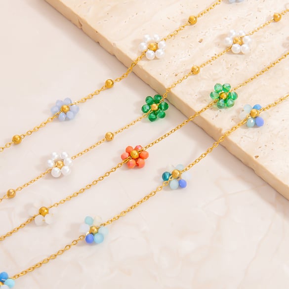 Braccialetti con ciondoli da donna in acciaio inossidabile color oro con fiori dolci