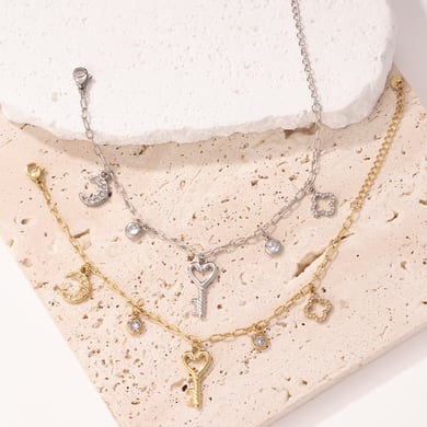 Braccialetti con ciondolo a forma di chiave a forma di cuore in acciaio inossidabile color oro da donna h5 Immagine3