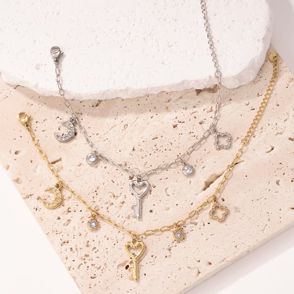 Braccialetti con ciondolo a forma di chiave a forma di cuore in acciaio inossidabile color oro da donna