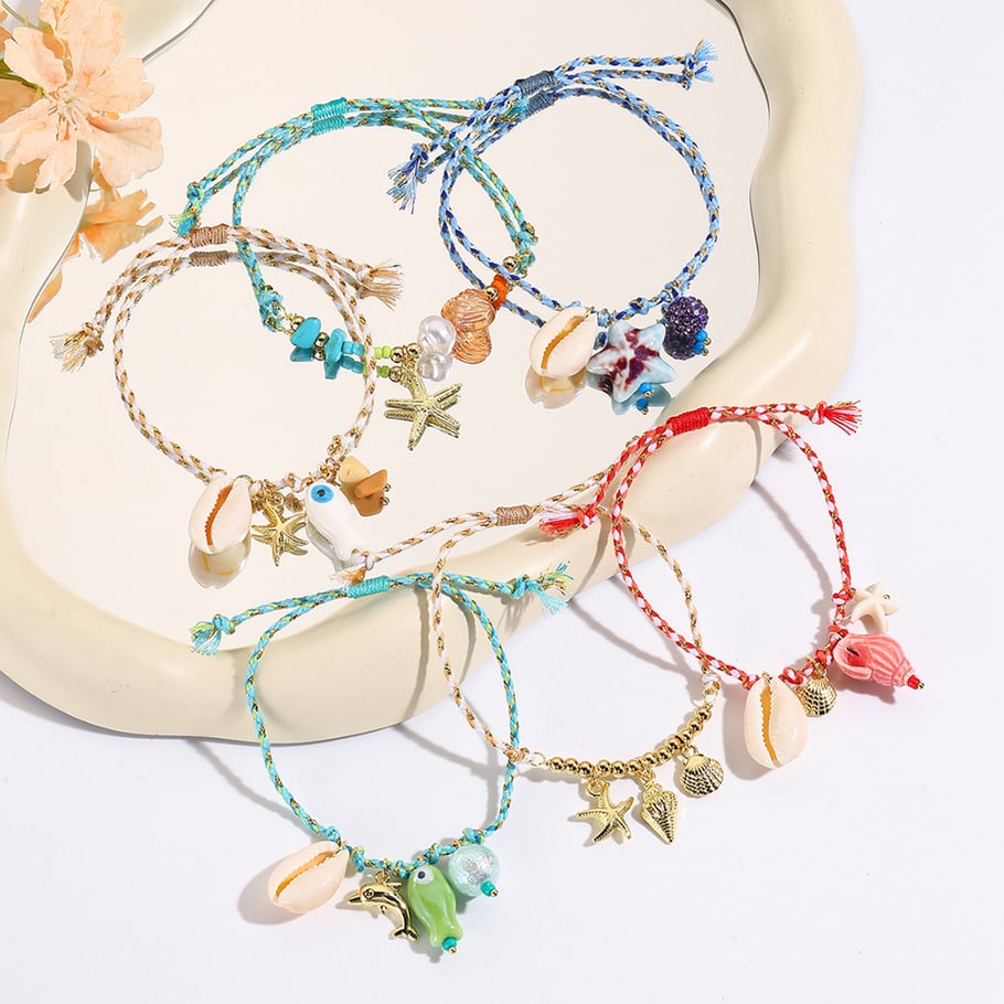 Creatieve DIY armbanden van touw met hangers in de vorm van een zeester Afbeelding2
