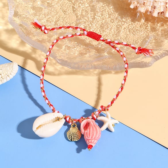 Braccialetti con ciondoli a forma di pesce