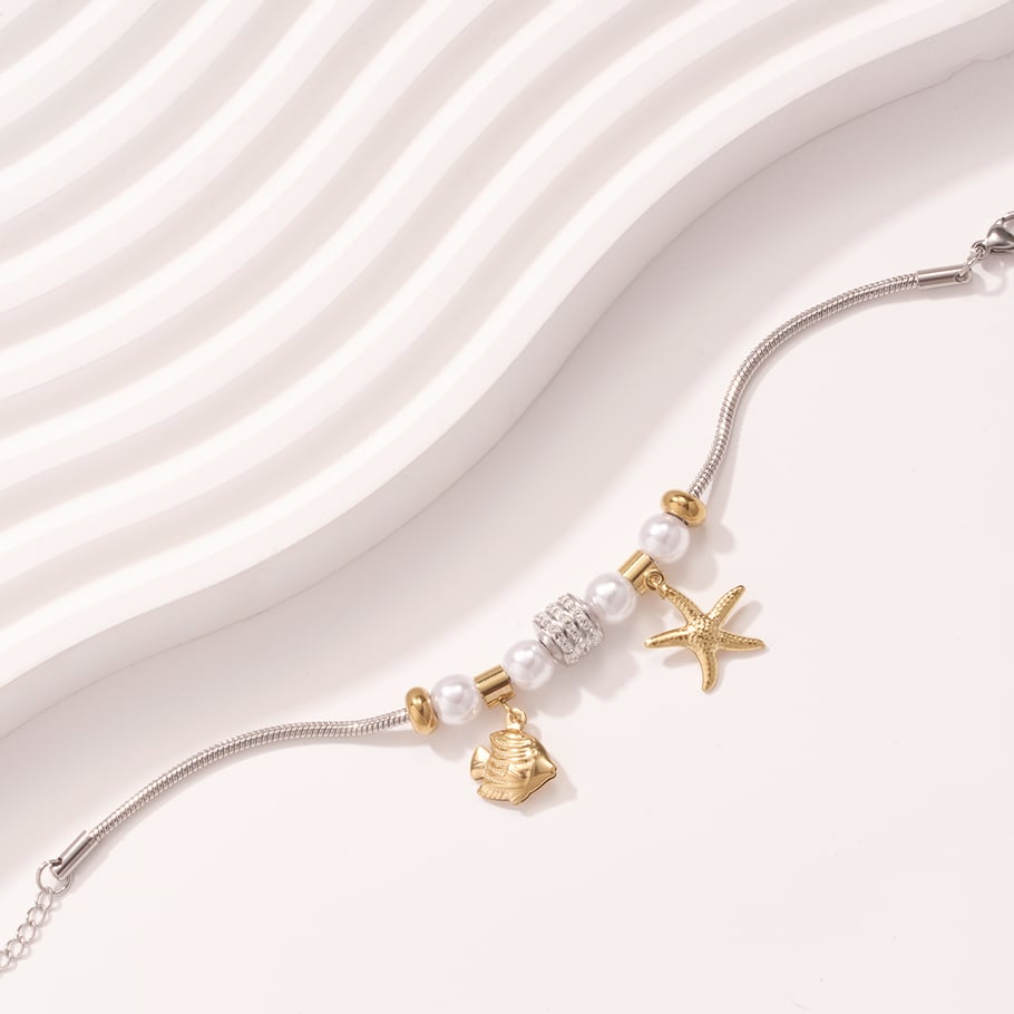 Braccialetti con ciondoli da donna in acciaio inossidabile color oro con pesci tropicali Immagine6