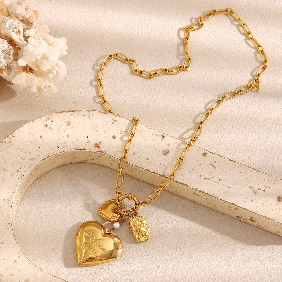 Collane da donna in acciaio inossidabile dorato con ciondolo a forma di cuore classico in stile lussuoso Immagine3