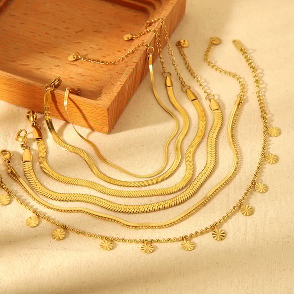 1 paio di cavigliere semplici in acciaio inossidabile color oro con catena giornaliera