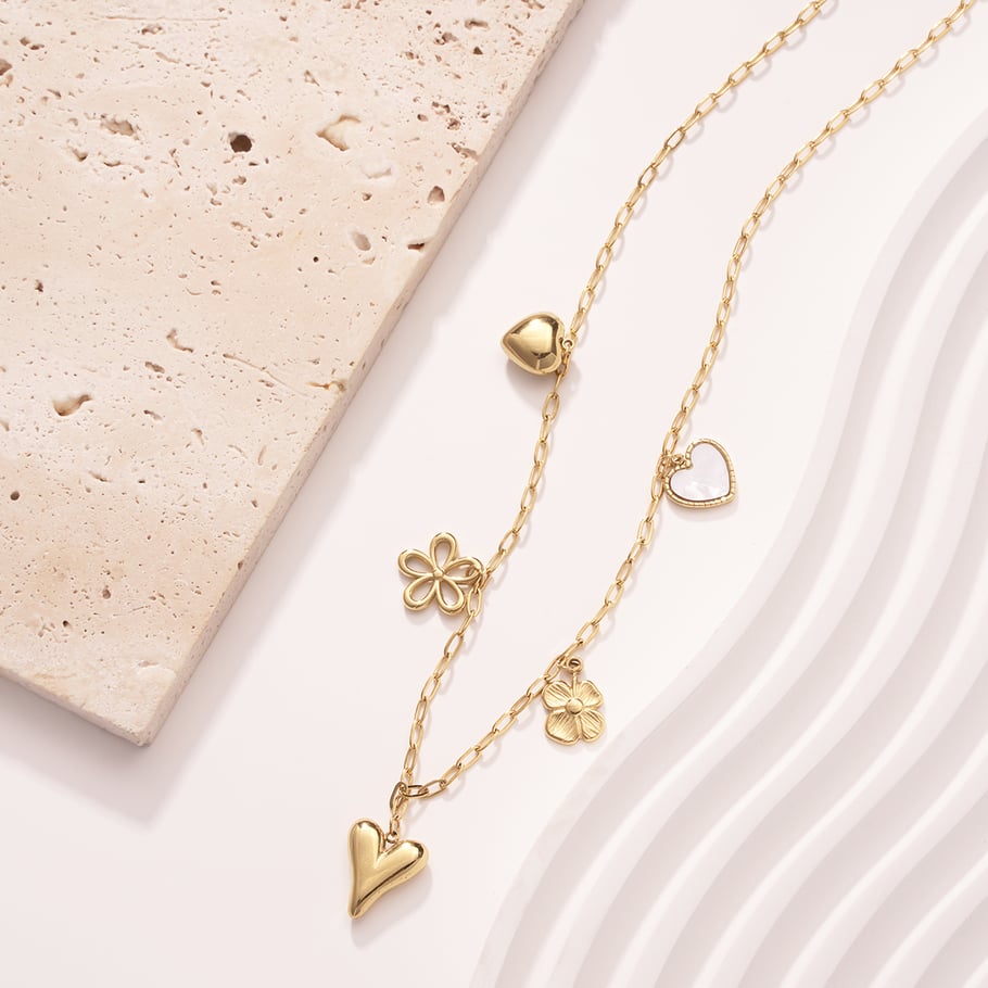 Fonkelende hartvormige bloemvormige hangerketting van roestvrij staal met gouden hanger voor dames Afbeelding4