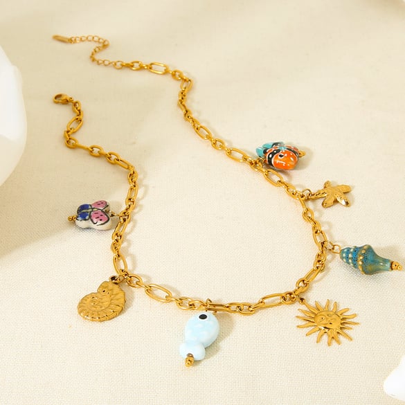 Collar de acero inoxidable con colgante de cerámica y elementos marinos para mujer 2