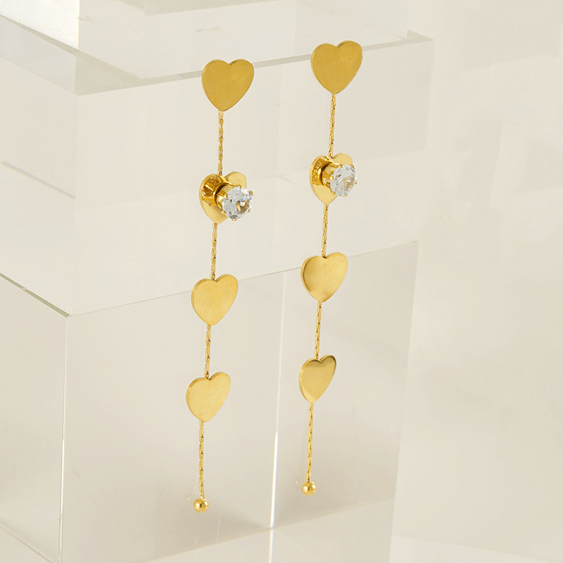 Orecchini pendenti con nappa in acciaio inossidabile color oro Immagine3