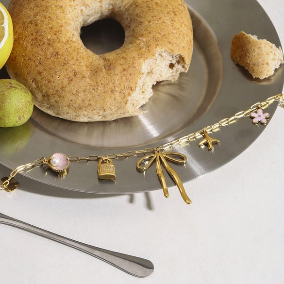 Halskette mit Anhänger aus Edelstahl mit Schleife und goldfarbenem Knoten