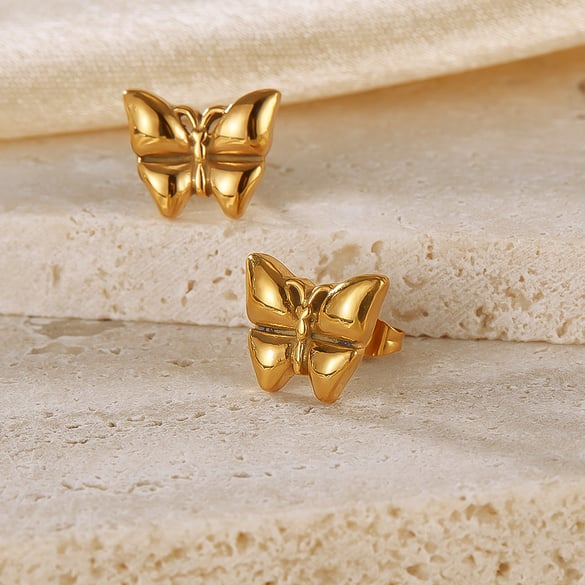 1 par de pendientes de botón de acero inoxidable dorados con diseño de animales para mujer, serie simple, para uso diario 2