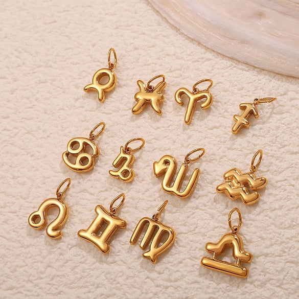 Ciondoli in acciaio inossidabile color oro con i dodici segni zodiacali