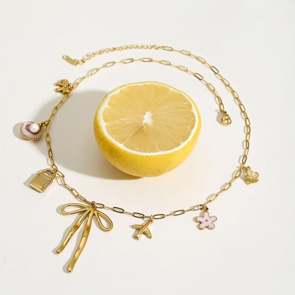 Halskette mit Anhänger aus Edelstahl mit Schleife und goldfarbenem Knoten 2