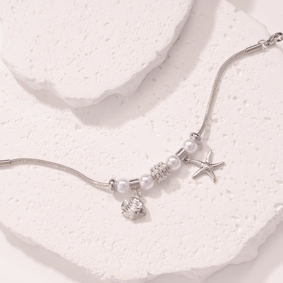 Braccialetti con ciondoli da donna in acciaio inossidabile color oro con pesci tropicali Immagine5
