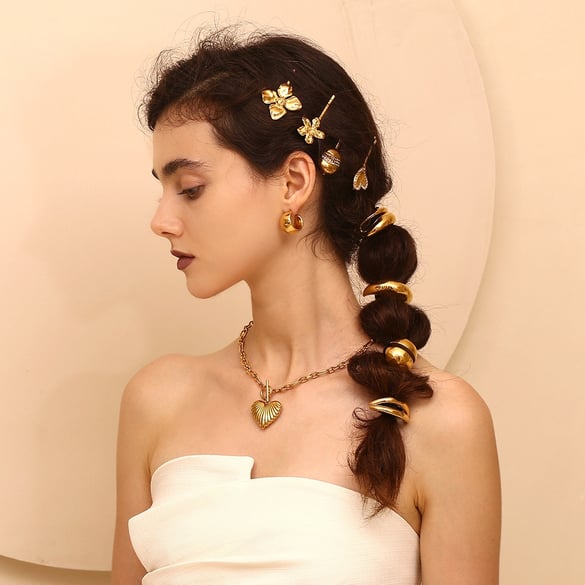1 pezzo di eleganti elastici per capelli in acciaio inossidabile color oro della serie Ocean 2