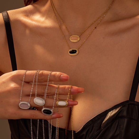 1 par de collares colgantes geométricos de acero inoxidable para mujer, de serie simple y diaria.