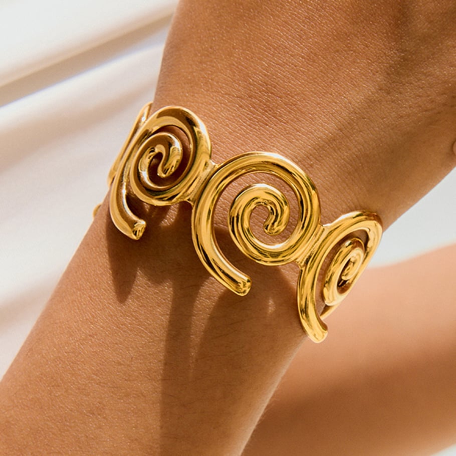 1 Stück klassische Spiral-Armreifen aus Edelstahl in Goldfarbe für Damen Bild3