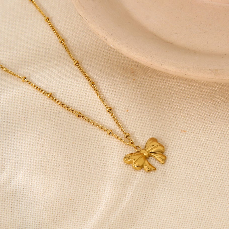 Colliers pendentifs pour femmes en acier inoxydable avec nœud papillon doux, série romantique Image4
