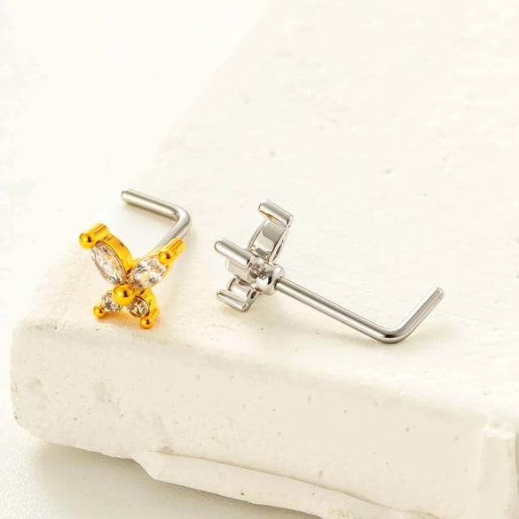 1 piercing para la nariz con circonita color cobre y dorado. 2
