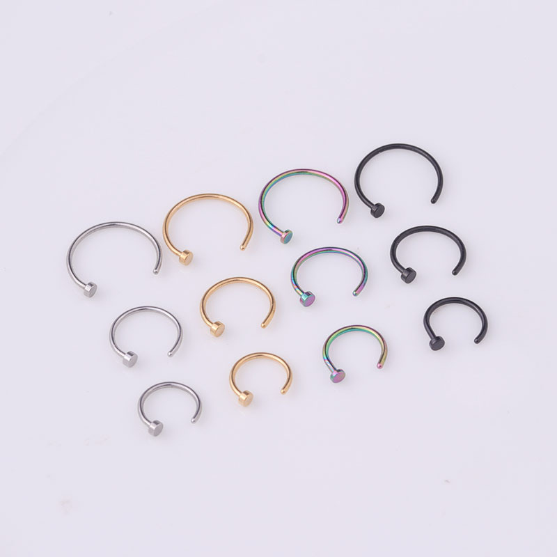 1 par de piercings para la nariz de acero inoxidable dorados con diseño geométrico simple para mujer Imagen3