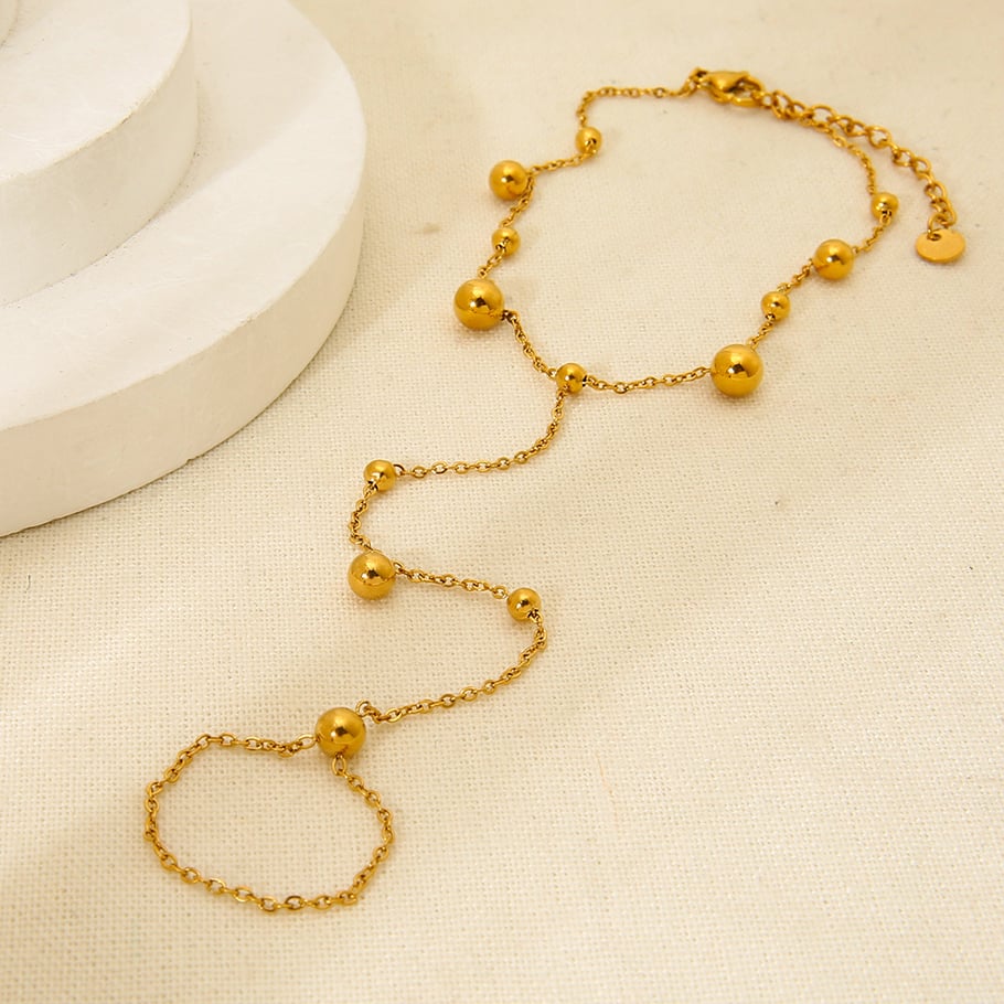 Pulsera de acero inoxidable color dorado con cierre de dedo. Imagen2