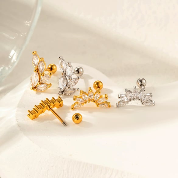 1 pezzo di orecchini con zirconi color rame e oro