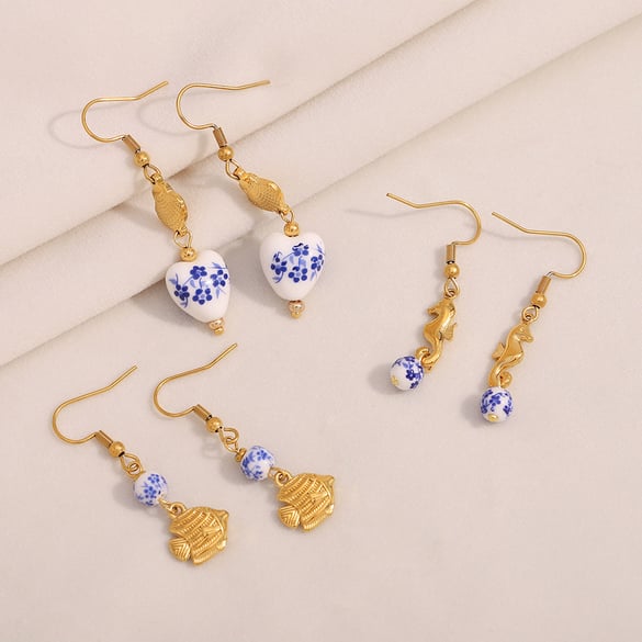 1 par de pendientes de acero inoxidable con diseño de animales para mujer, serie simple, para uso diario 2