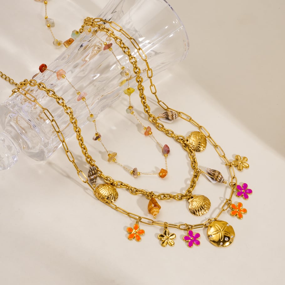 Eleganti collane con ciondolo a forma di fiore in acciaio inossidabile color oro da donna Immagine2