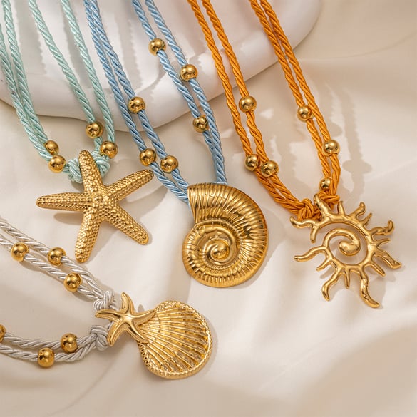 1 collar con colgante de estrella de mar de acero inoxidable color dorado
