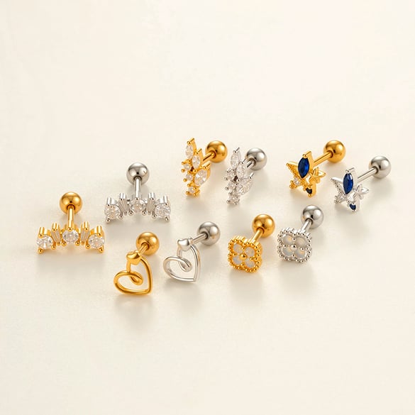 1 orecchino piercing in zircone color rame e oro