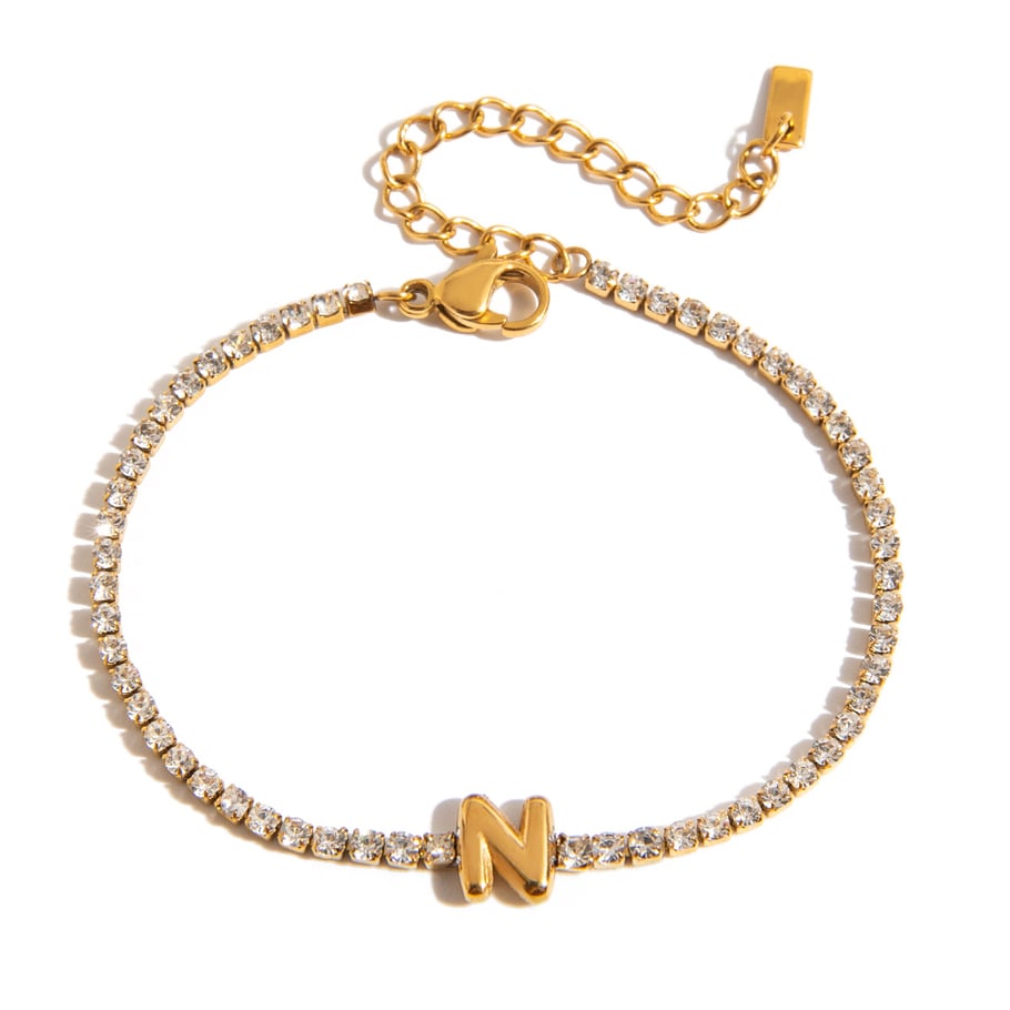 1 pulsera delicada con letras de acero inoxidable en color dorado para mujer. 