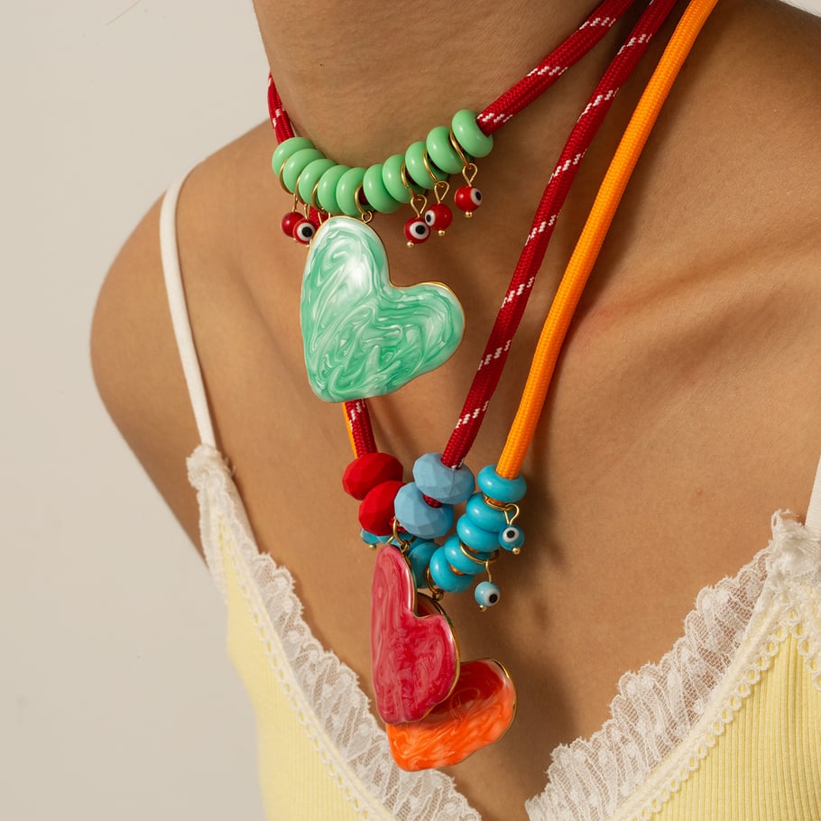 1 pezzo di collana con ciondolo a forma di cuore in smalto gocciolante in acciaio inossidabile color oro da donna Immagine2