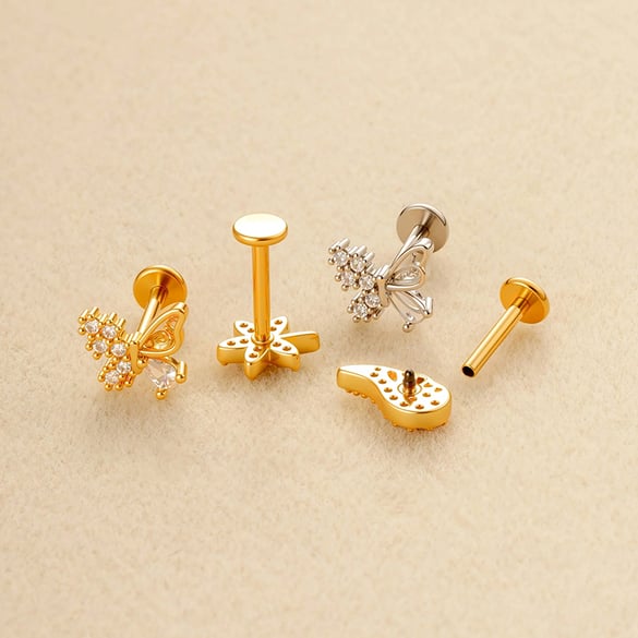 1 orecchino piercing a farfalla in zircone color rame e oro 2