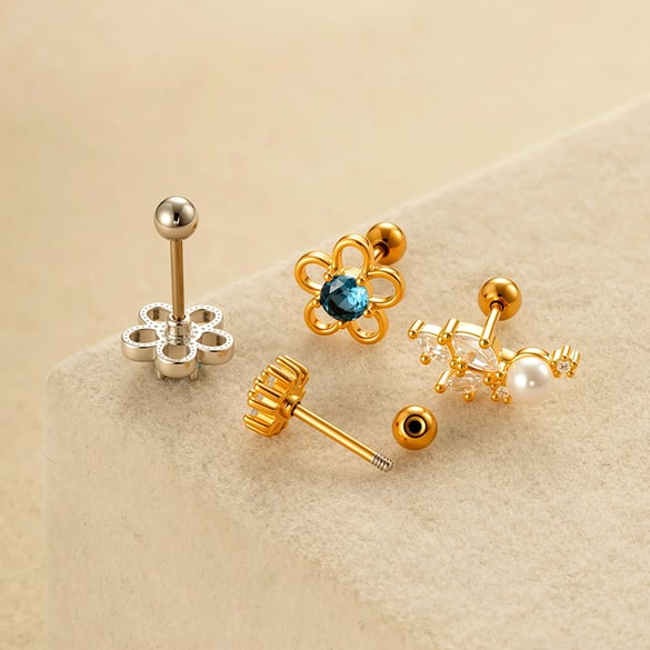 1 orecchino piercing con fiore in zircone color rame e oro