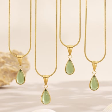 1 pezzo di splendida collana con ciondolo a goccia in vetro color oro in acciaio inossidabile da donna h5 Immagine6