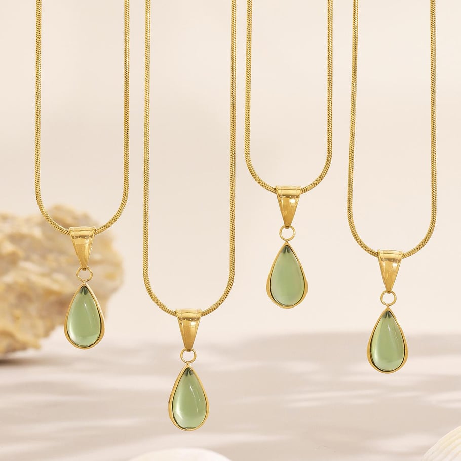 1 pezzo di splendida collana con ciondolo a goccia in vetro color oro in acciaio inossidabile da donna Immagine6