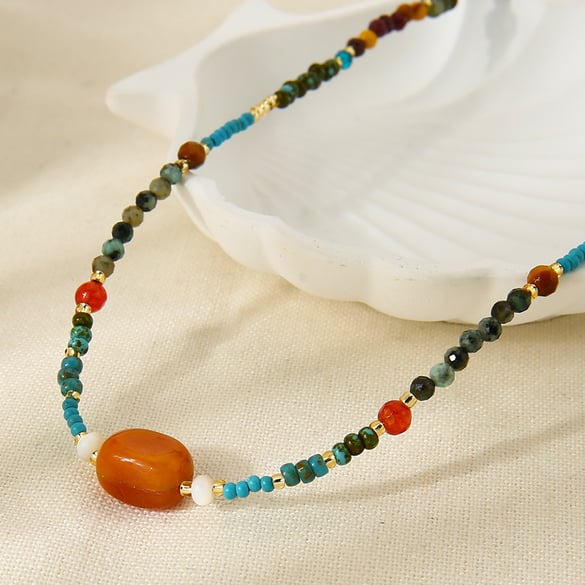 Collana con perline color oro e pietre naturali da 1 pezzo