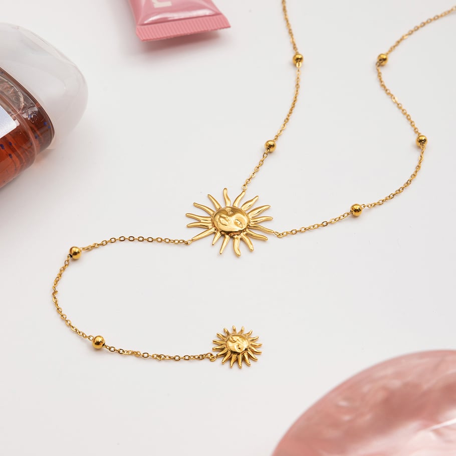 1 collar con colgante de cadena larga de acero inoxidable dorado con diseño de sol sexy para mujer Imagen6