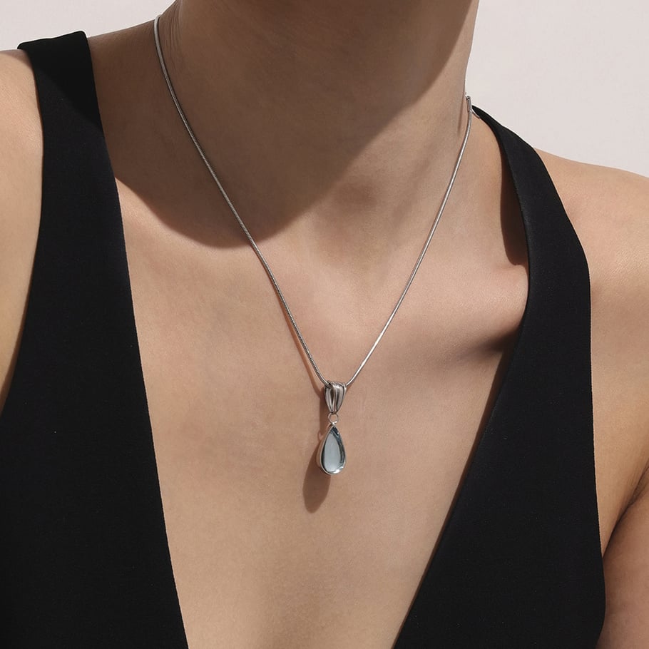 1 pezzo di splendida collana con ciondolo a goccia in vetro color oro in acciaio inossidabile da donna Immagine4