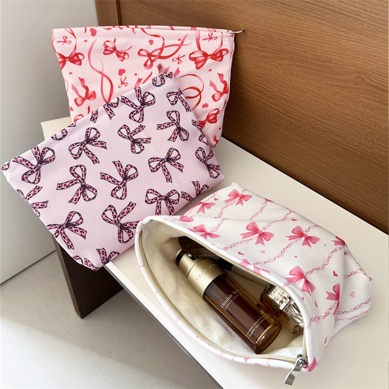 1 Stück Premium gestreifte Schleife Damen Make-up Tasche Bild4