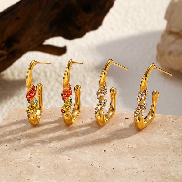 1 Paar Creolen aus Edelstahl in unregelmäßiger Form und Goldfarbe 2