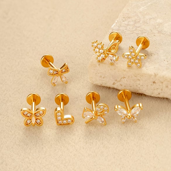 1 orecchino piercing a farfalla in zircone color rame e oro