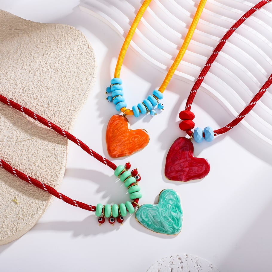 1 pezzo di collana con ciondolo a forma di cuore in smalto gocciolante in acciaio inossidabile color oro da donna Immagine3