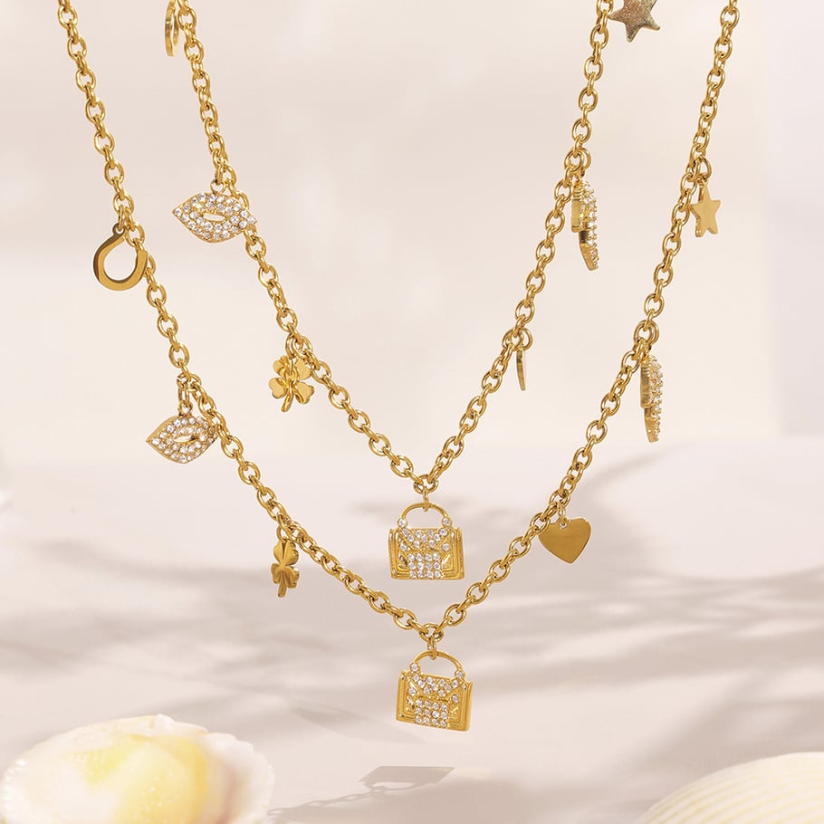 Conjuntos de joyas de acero inoxidable con forma de corazón y trébol de color dorado para mujer. Imagen3