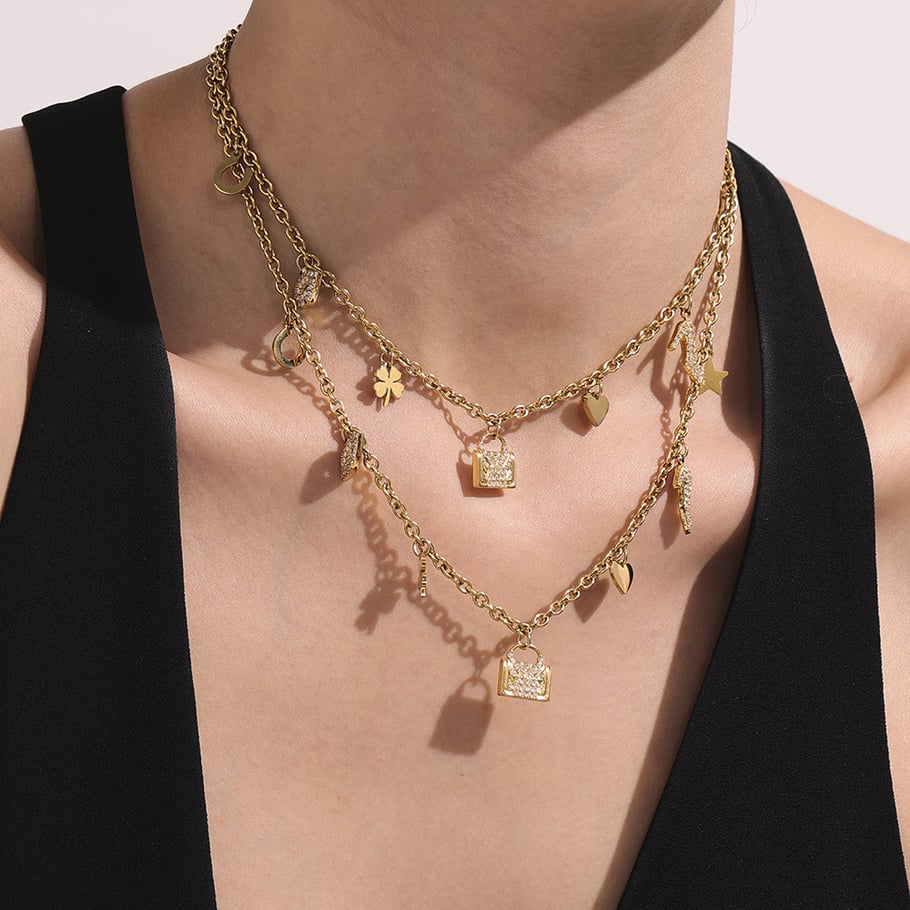 Conjuntos de joyas de acero inoxidable con forma de corazón y trébol de color dorado para mujer. Imagen4
